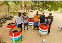 Gambian Student Turns Discarded Tires into Trash Cans, Leading Community Drive for a Cleaner Nation