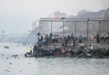 Spain’s PM visits Ceuta after 34 migrants die breaching border from Morocco