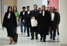 Suspected smugglers on trial over deadliest migrant tragedy in France