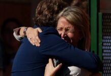 ‘I held this woman in my arms. She died’: Spain mourns train crash victims